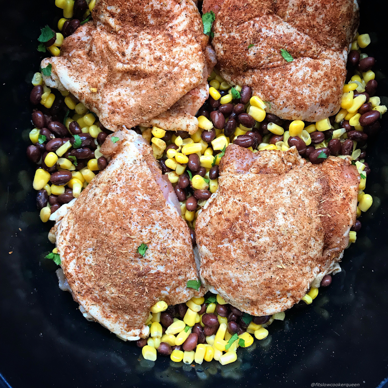 Jerk chicken, quick and in the slow cooker! Grab your favorite jerk seasoning (or use the one provided here) for this easy slow cooker recipe. With only 5 ingredients, you can pretty much use any cut of chicken and serve the finished product so many different ways.