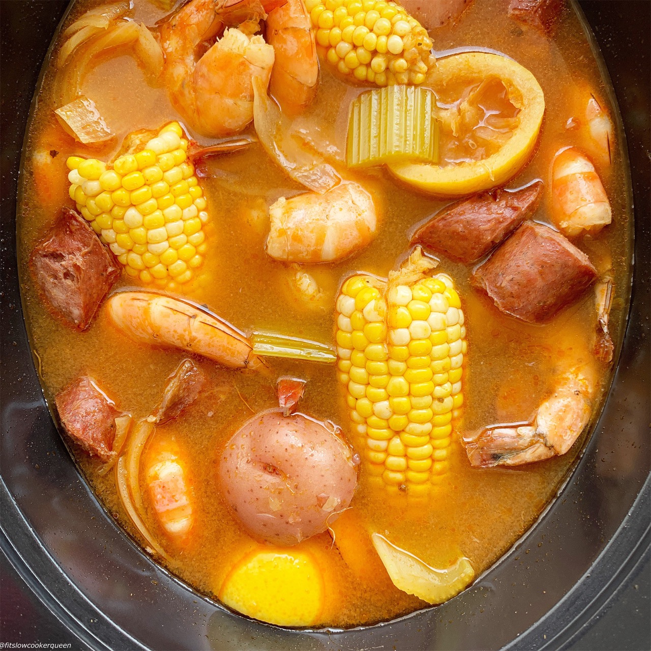 Cajun seasoning spices up this easy slow cooker low country boil. Simple yet packed full of flavor,  you can serve this Cajun dish year-round.