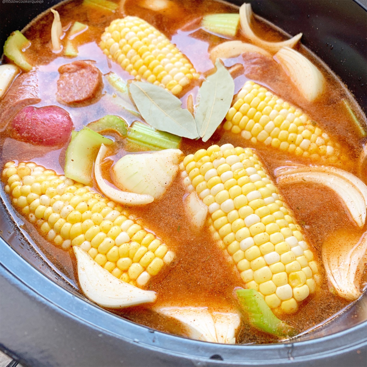 Cajun seasoning spices up this easy slow cooker low country boil. Simple yet packed full of flavor,  you can serve this Cajun dish year-round.