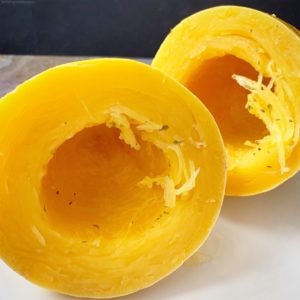 Lighten up your shrimp scampi with this slow cooker version. This easy shrimp scampi recipe is served with spaghetti squash and cooked all in one pot.