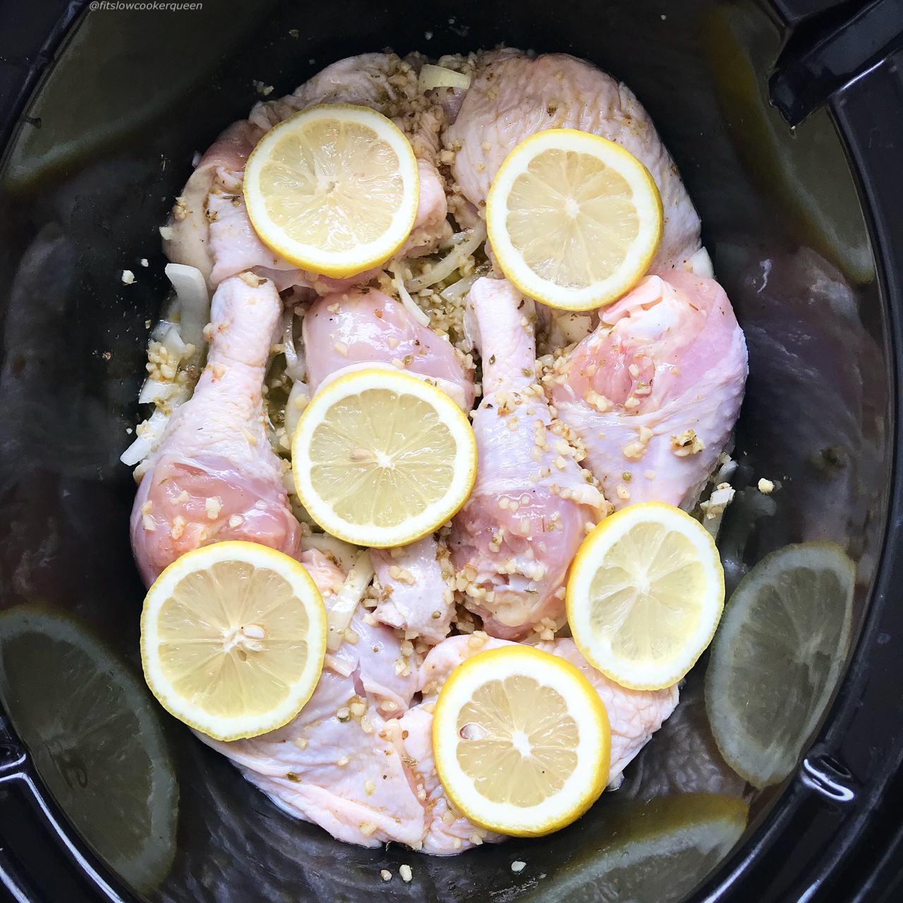 A simple garlic citrus sauce based on Cuban mojo marinade cooks with chicken (or pork) in this healthy (paleo,whole30) slow cooker recipe. Serve this succulent chicken with your favorite side dishes for an easy yet flavorful meal.