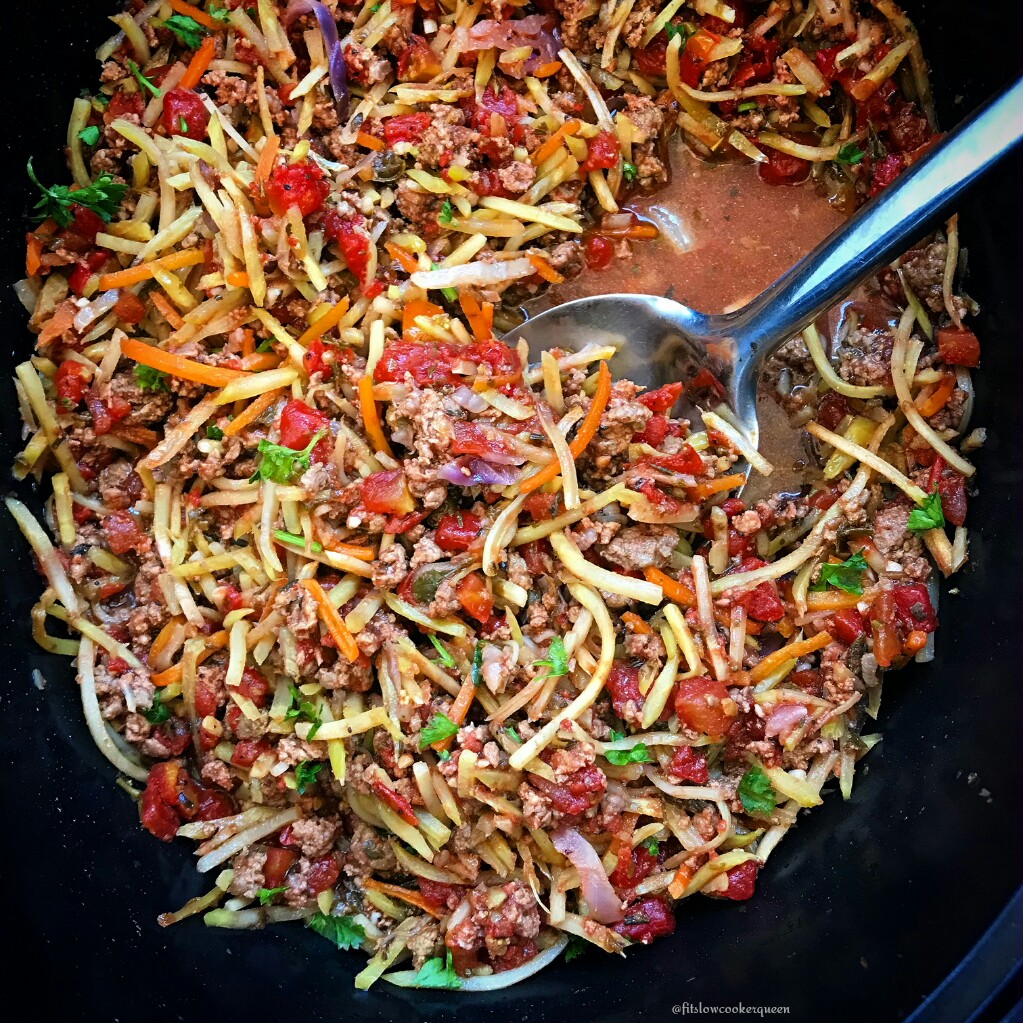 Slawghetti is broccoli slaw cooked in the slow cooker to a soft 'spaghetti' consistency. This is a great low-carb, paleo, and whole30 alternative to spaghetti that's not spaghetti squash.