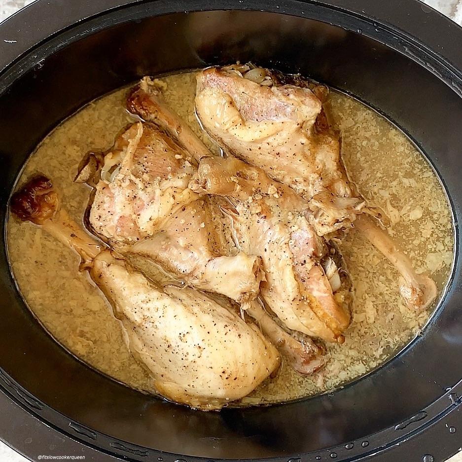 cooked turkey legs in coconut sauce in the slow cooker