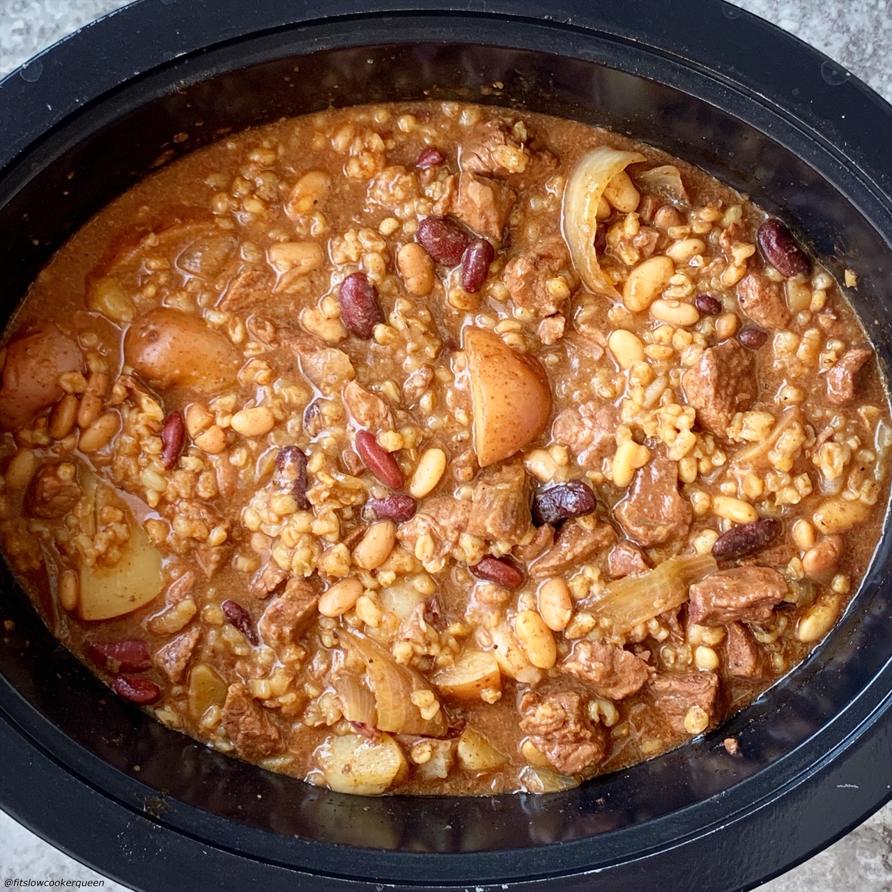 stirred cooked cholent in the slow cooker