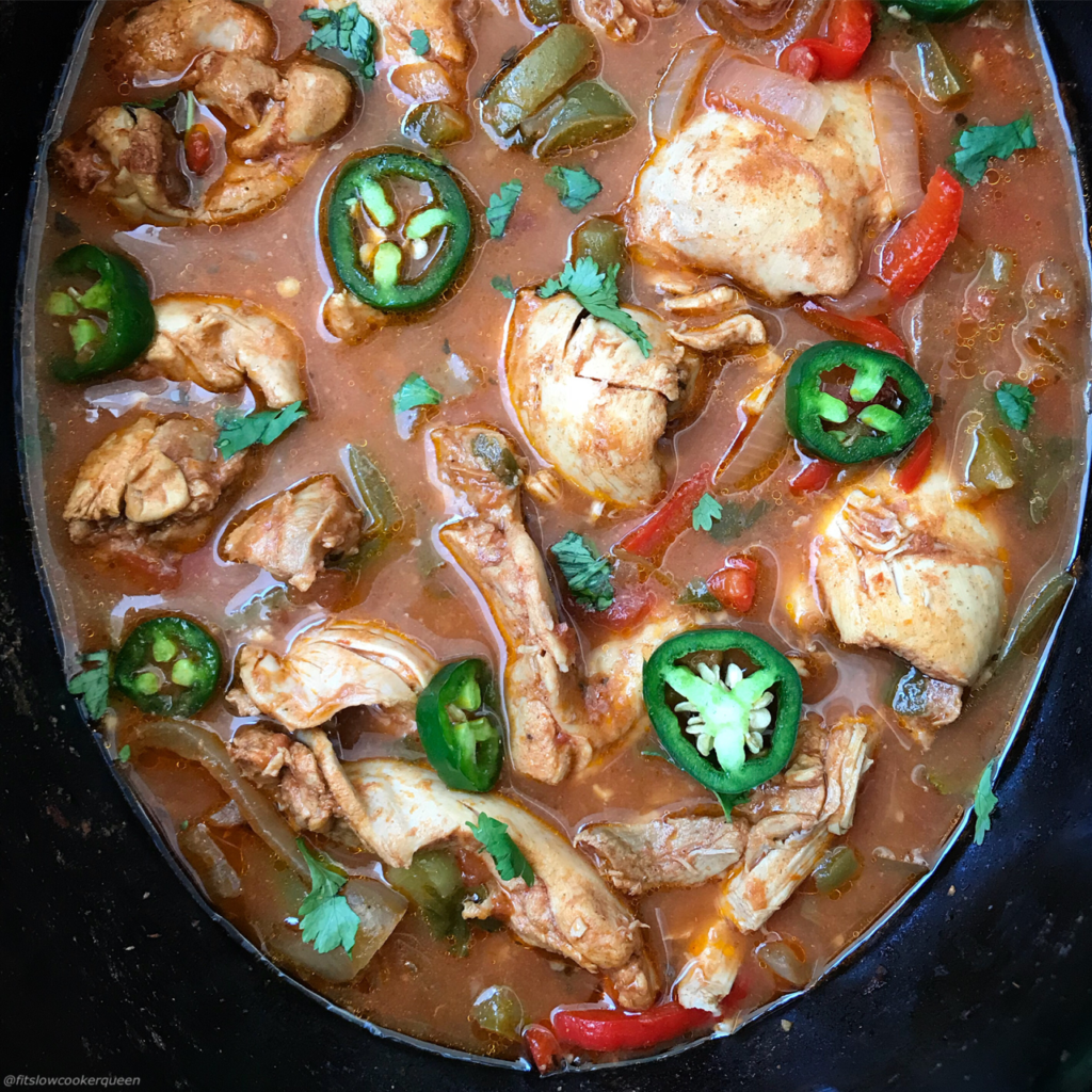 close up of cooked Spicy Salsa Chicken in the slow cooker