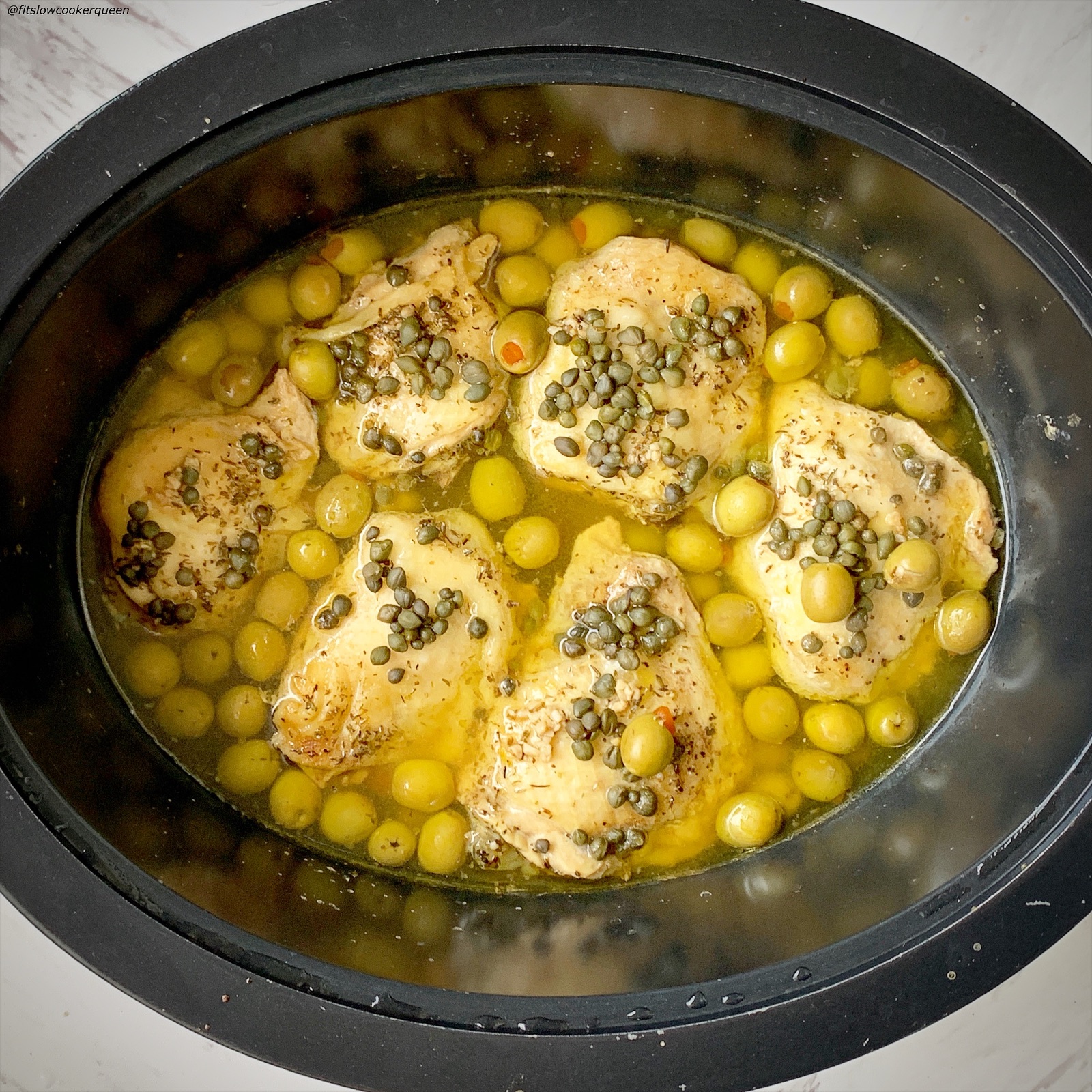 after pic of cooked food in the slow cooker for Slow Cooker Instant Pot Chicken, Olives & Capers (Low-Carb, Paleo, Whole30) 