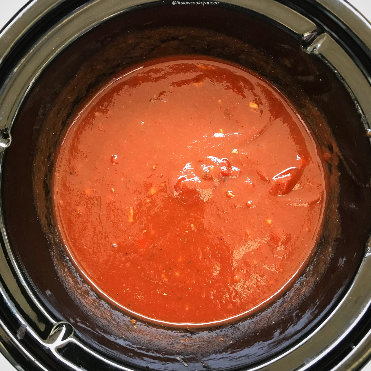 This tangy, homemade slow cooker BBQ sauce is sugar-free, gluten-free, whole30 compliant, and paleo but still packed with flavor.