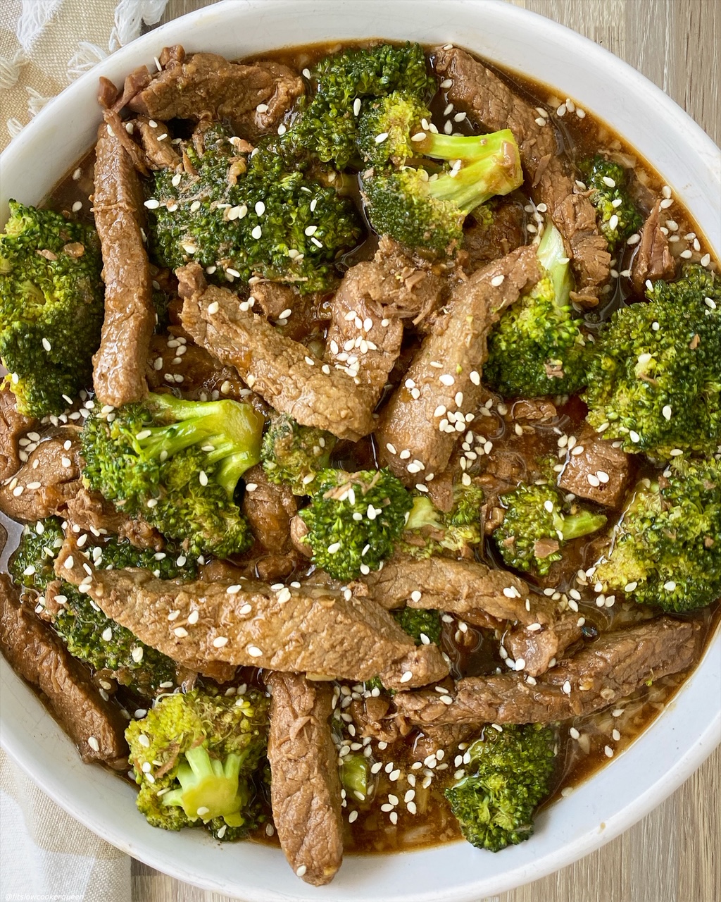 close up of cooked beef & broccoli in a bowl