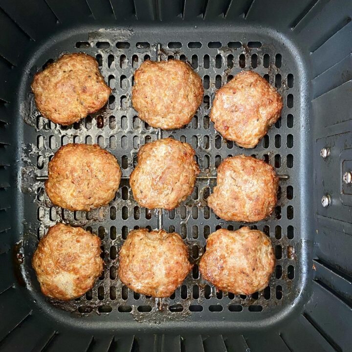 cooked breakfast sausage in the air fryer basket