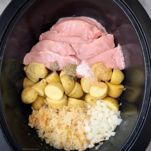 Pork & sauerkraut, an old country favorite that can be surprisingly healthy. This easy slow cooker or Instant Pot version is both whole30 and paleo.