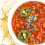 This salsa recipe is so easy & good you might never buy store-bought again. Using fresh ingredients, you'll have restaurant-style salsa made right in your slow cooker or Instant Pot.