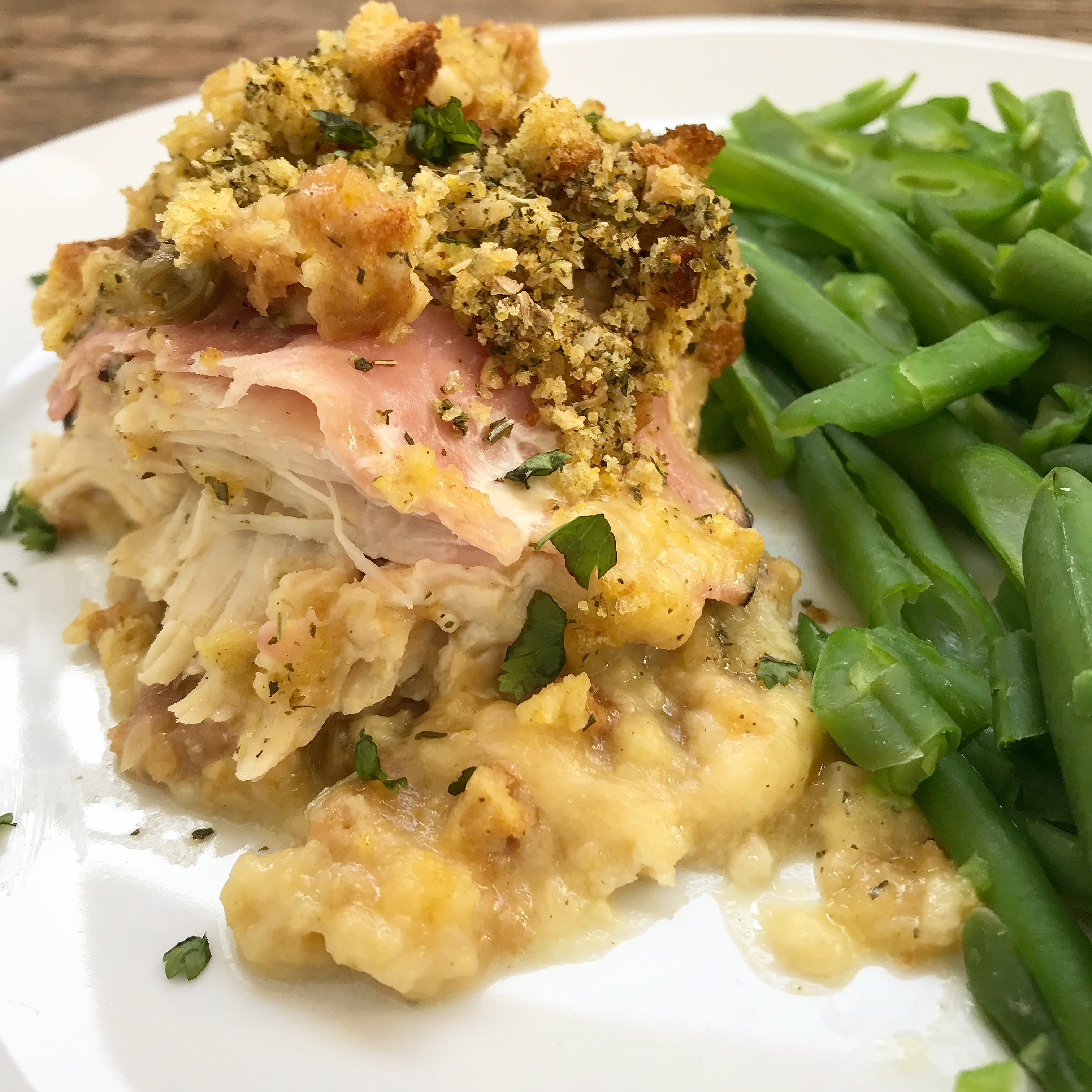 This skinny version of chicken cordon bleau uses a homemade sauce and gluten free stuffing for a healthier version of a comfort food classic.