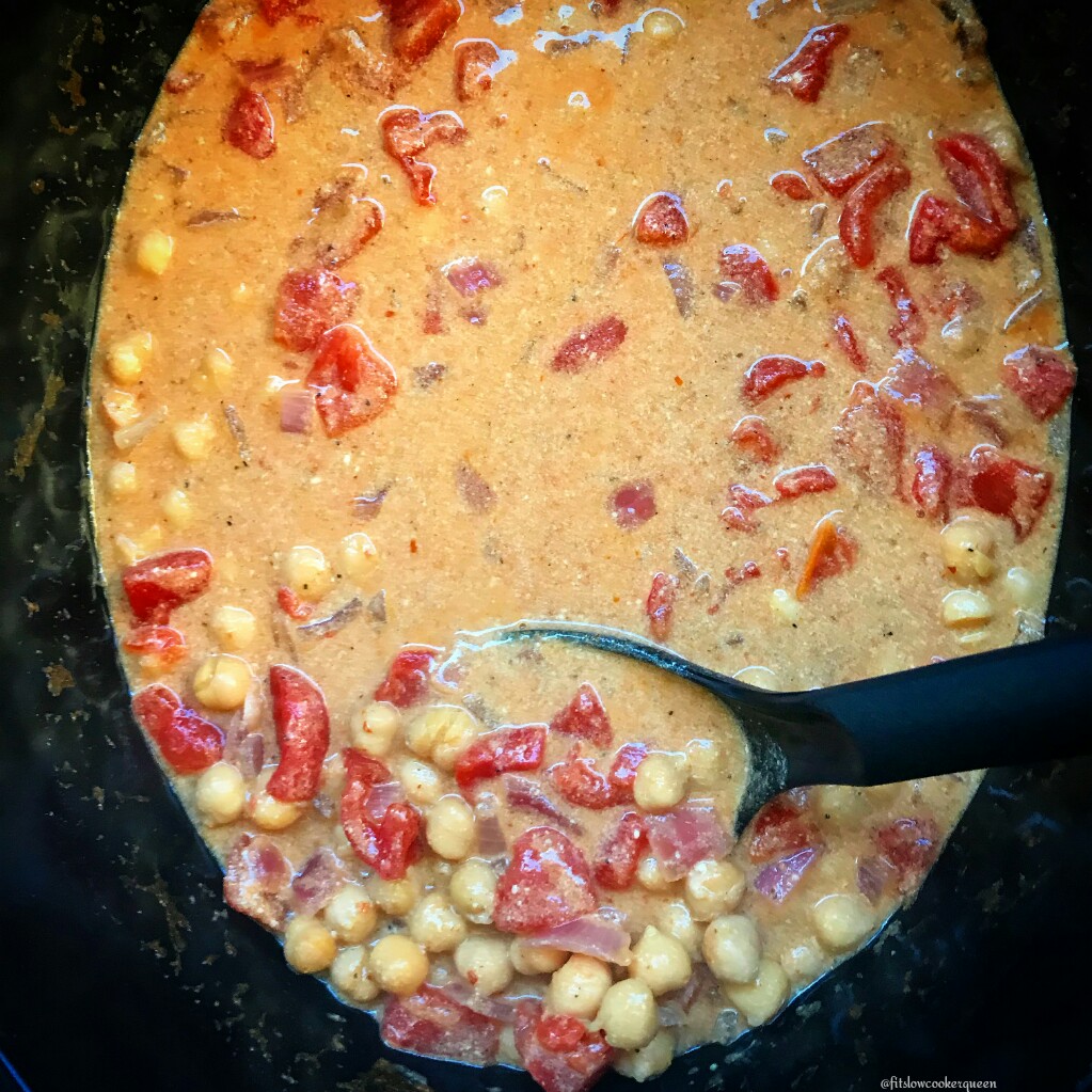 Chickpeas, coconut milk, and a few other simple ingredients slow cooker together in this flavorful vegan/vegetarian curry.