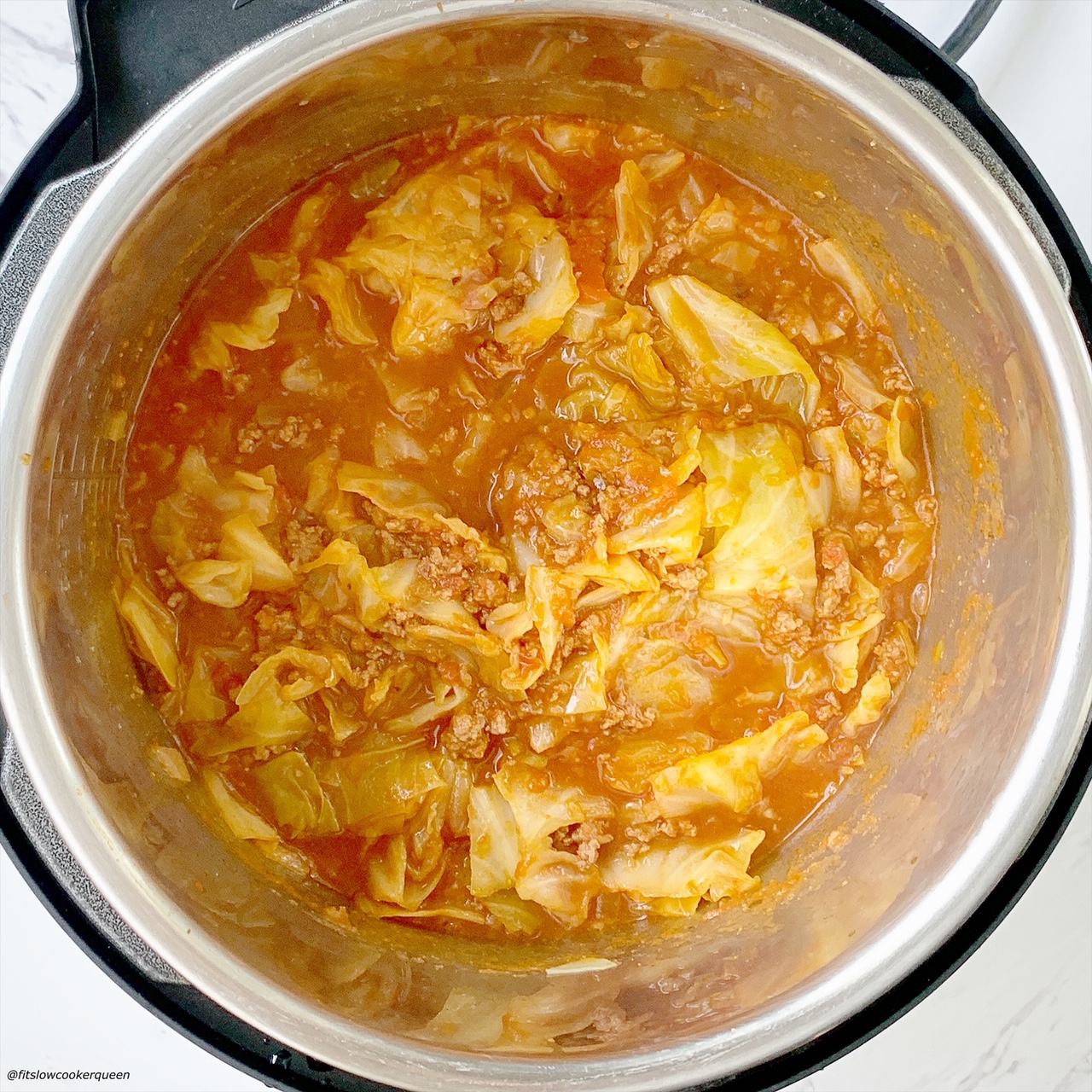cooked cabbage in the electric slow cooker