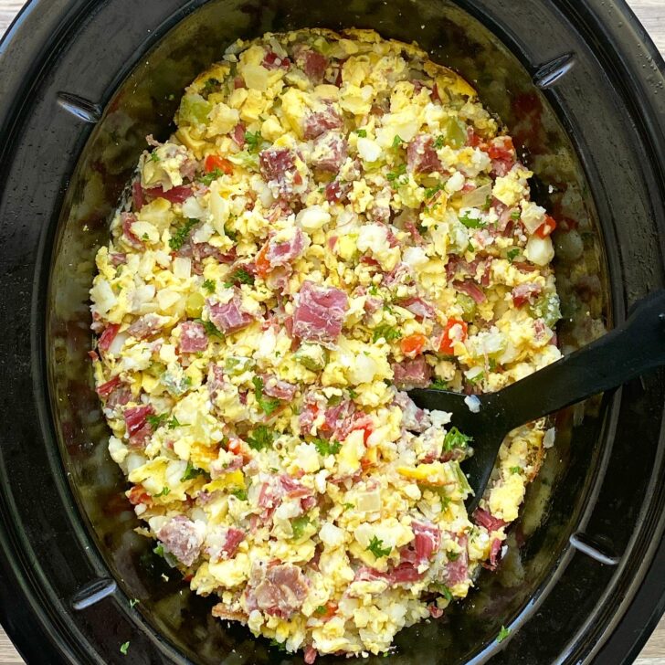 cooked corned beef hash in the slow cooker, scrambled