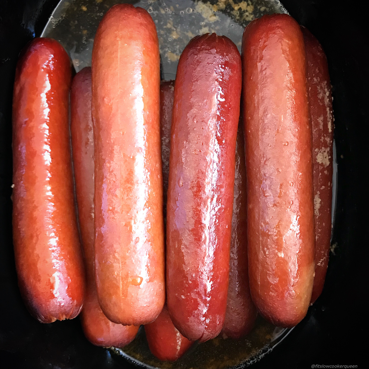 If you love steamed, 'ballpark' style hot dogs then throw them in your slow cooker! Perfect for feeding a crowd, this 1-ingredient recipe couldn't get any easier.