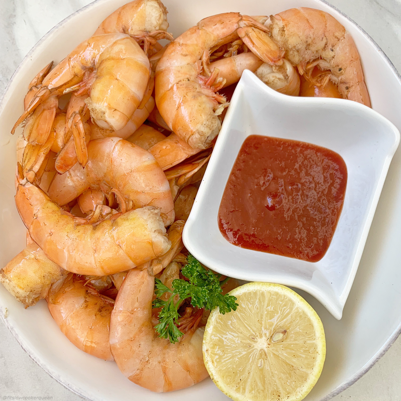 Peel and Eat shrimp are an easy, fun-to-eat shrimp dish. This slow cooker version uses a homemade Old Bay seasoning making healthy seasoned shrimp.