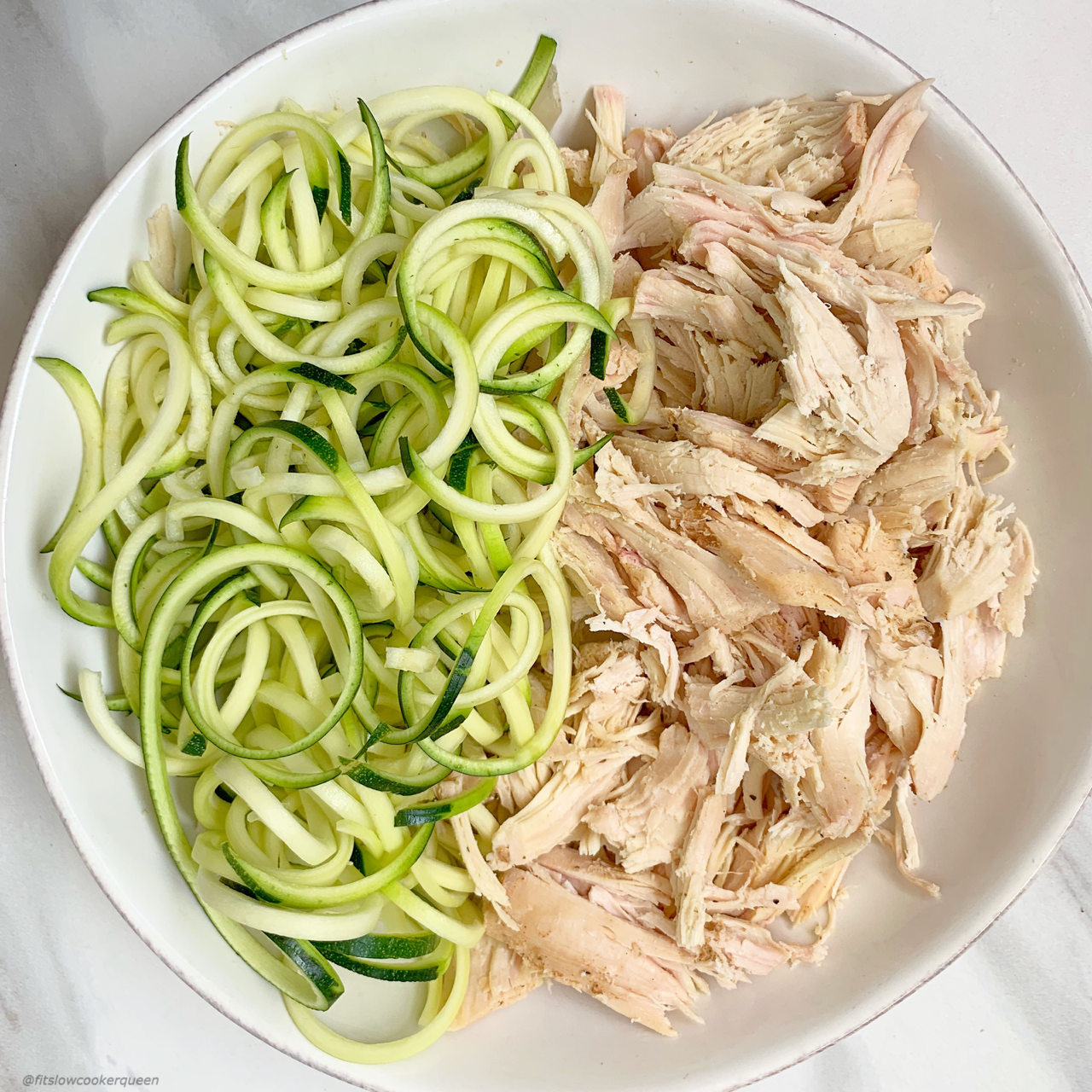 Zoodles lighten up this low-carb, paleo, and whole30 chicken soup recipe that can be made in your slow cooker or Instant Pot.