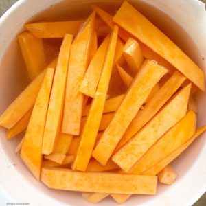 Air fryer, homemade french fries are not only healthy but easy to make. Use this paleo and whole30 recipe for homemade, oil-free french fries or sweet potato fries.