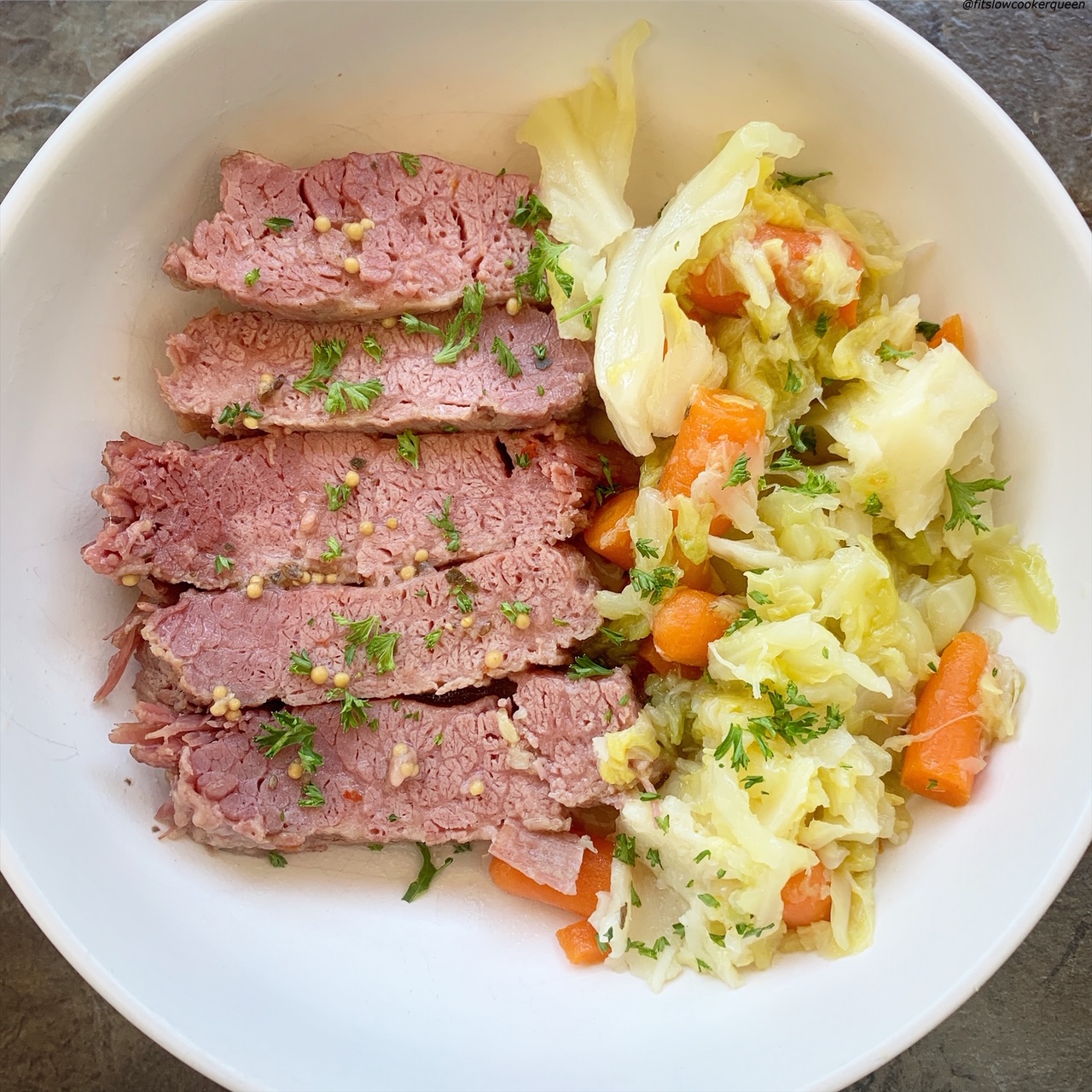 corned beef & cabbage on a white plate