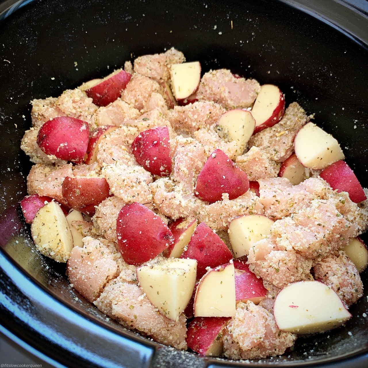 uncooked Garlic Parmesan chicken & potatoes in the slow cooker