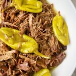 overhead shot of Mississippi roast on a white bowl