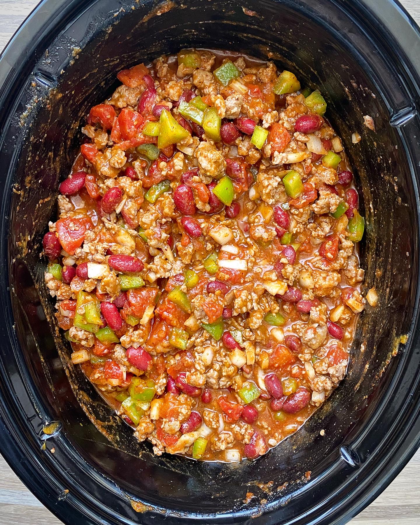 uncooked pumpkin chili in the slow cooker