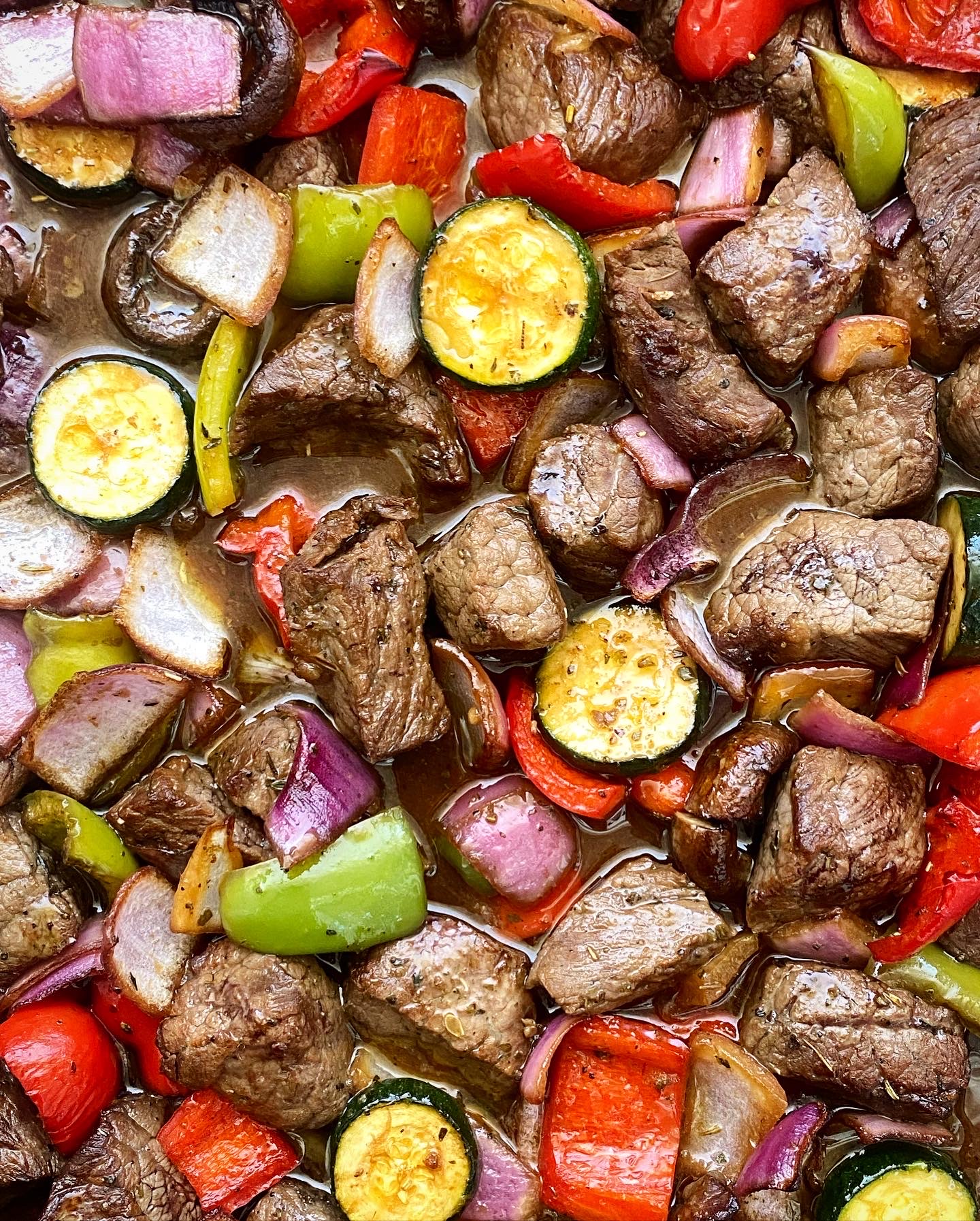 overhead, close up shot of sheet pan beef kebabs
