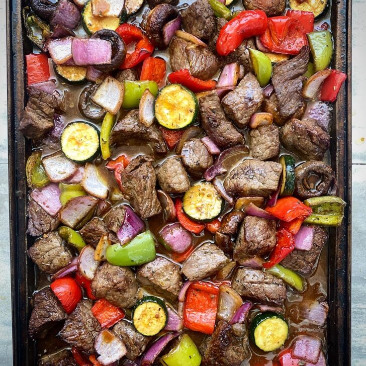 overhead shot of cooked sheet pan beef kebabs