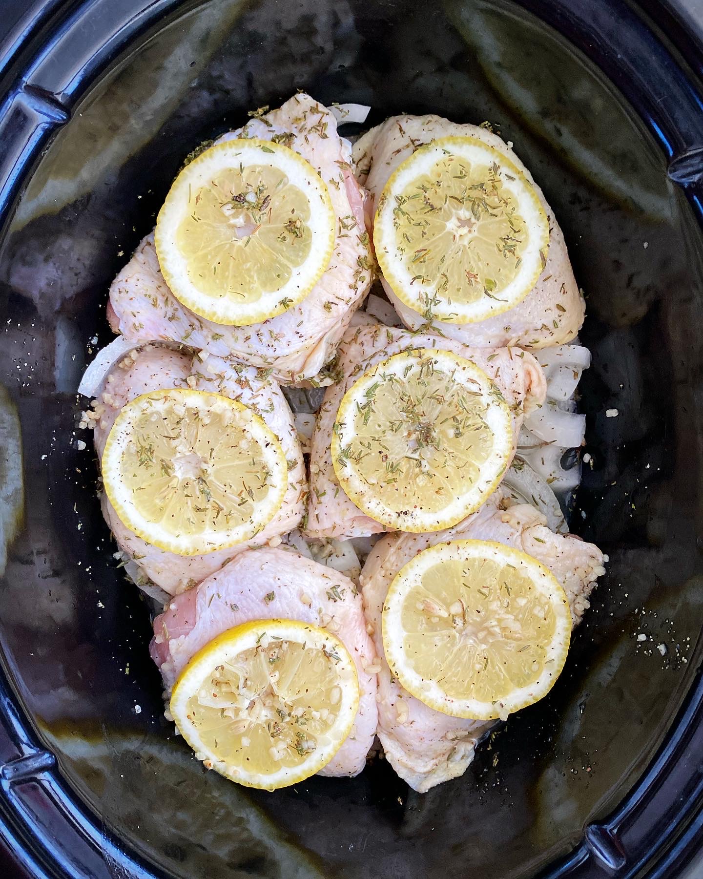 raw ingredients for lemon artichoke chicken in the slow cooker