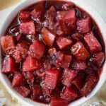 overhead shot of homemade cranberry sauce in a white bowl