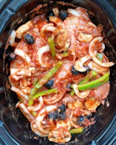 uncooked chicken cacciatore in the slow cooker