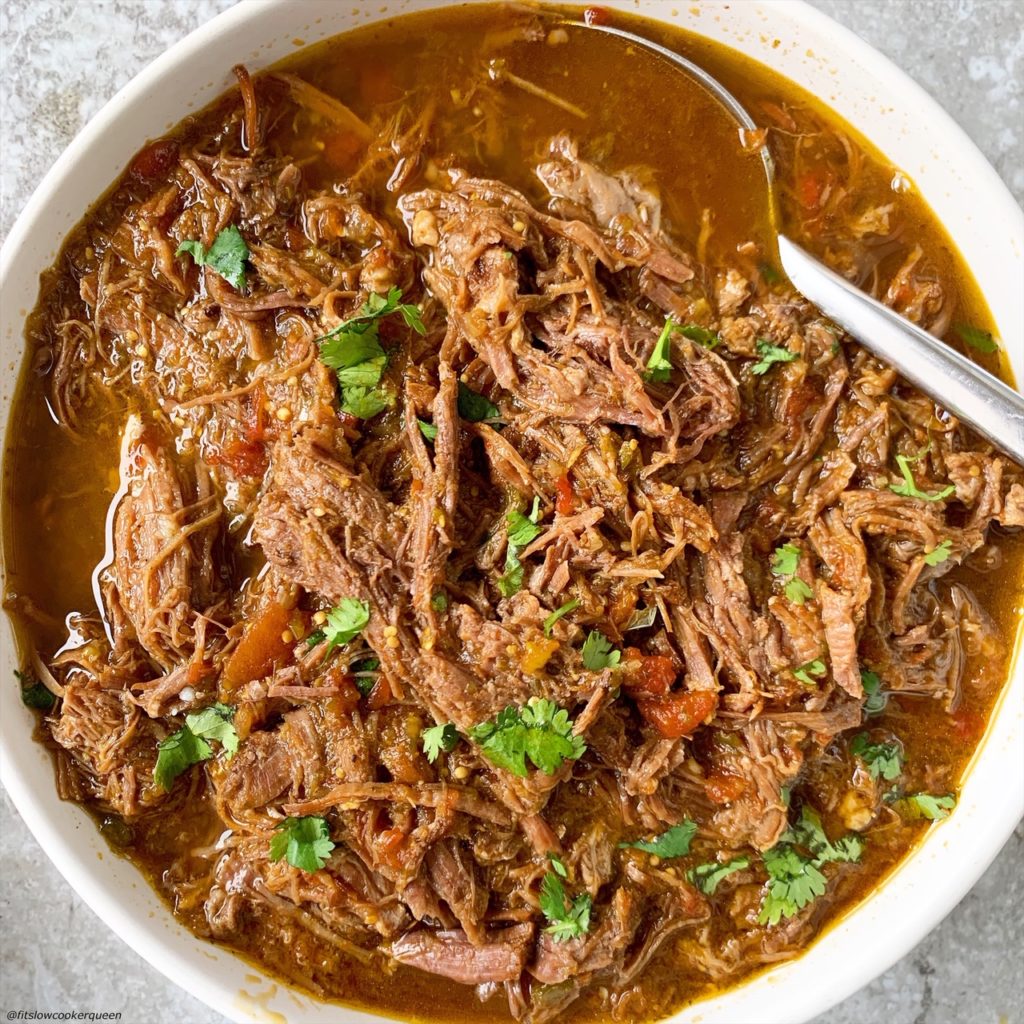 overhead shot of salsa verde beef in a white bowl