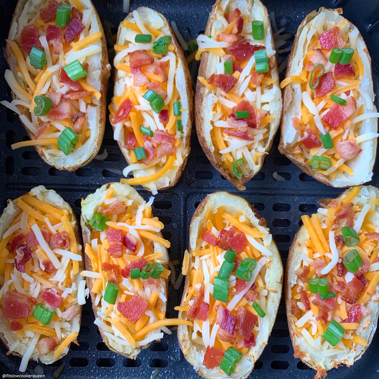 overview shot of raw potato skins in the air fryer