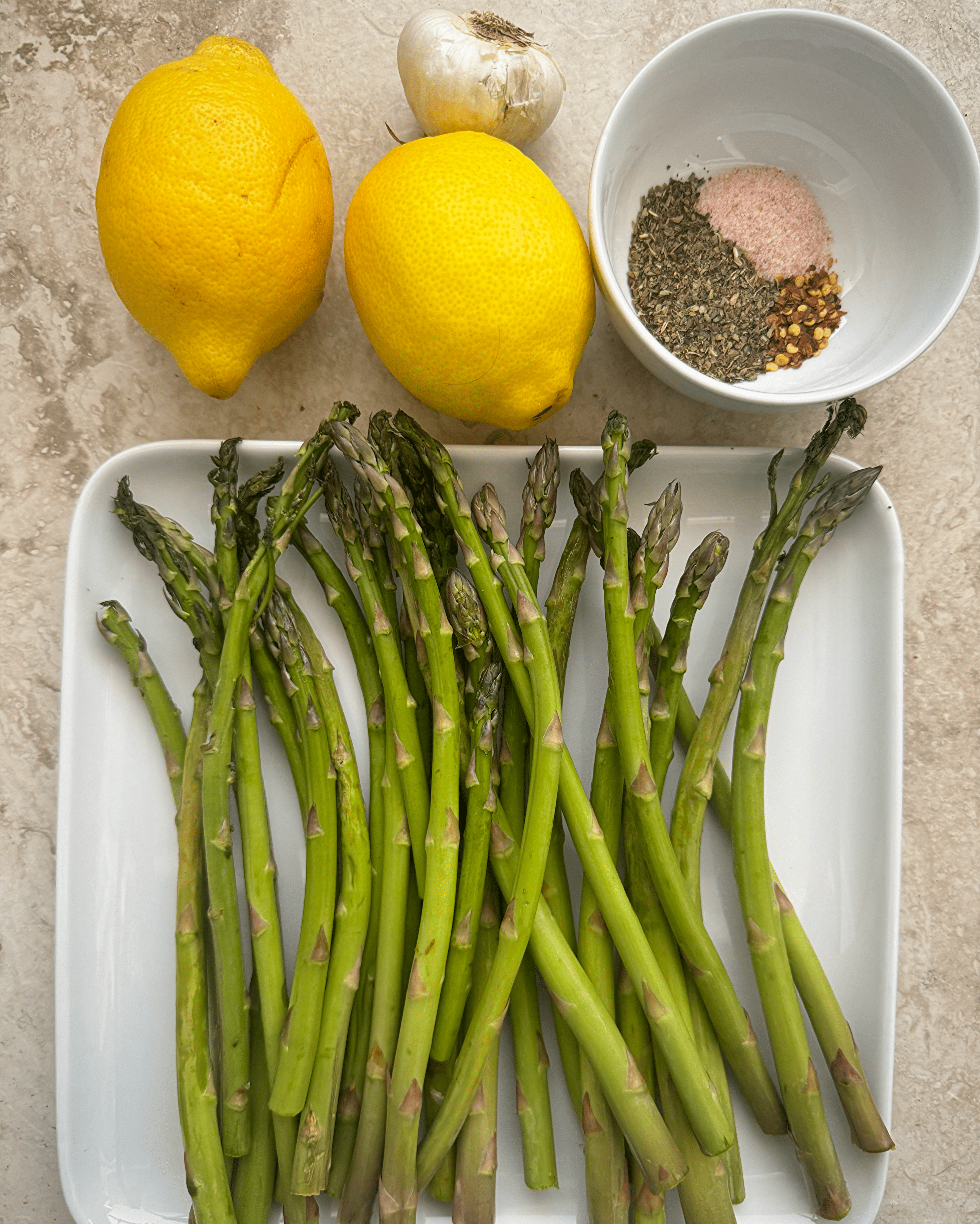 collage of ingredients for overhead shot of cooked close up shot of Slow Cooker Lemon Garlic Asparagus
