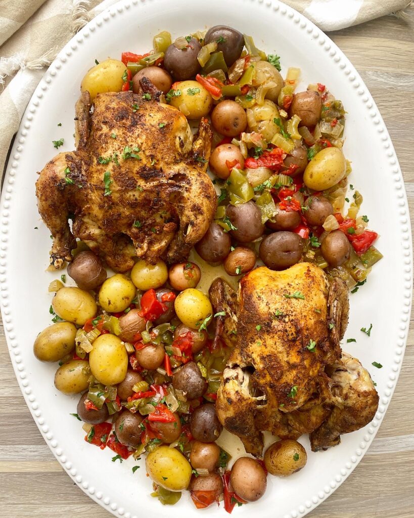 creole Cornish hens on a white platter