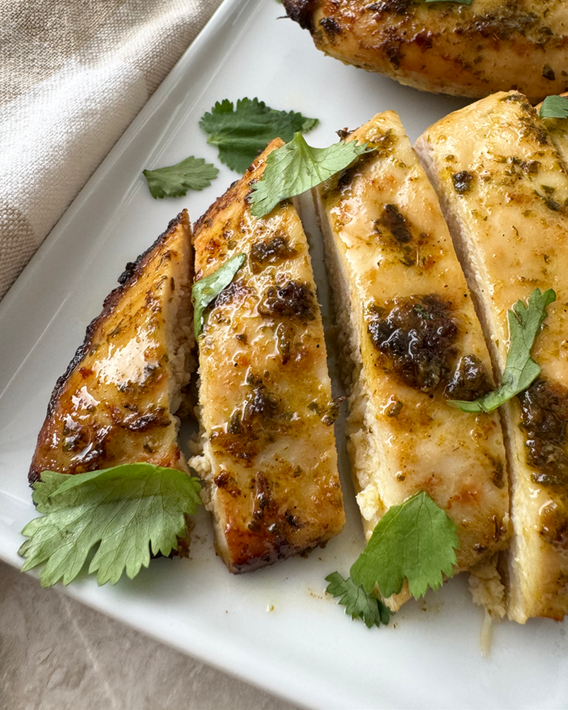 close up shot of a sliced cilantro lime chicken breast