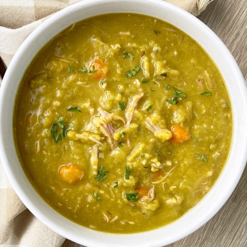 overhead shot of slow cooker split pea soup in a white bowl