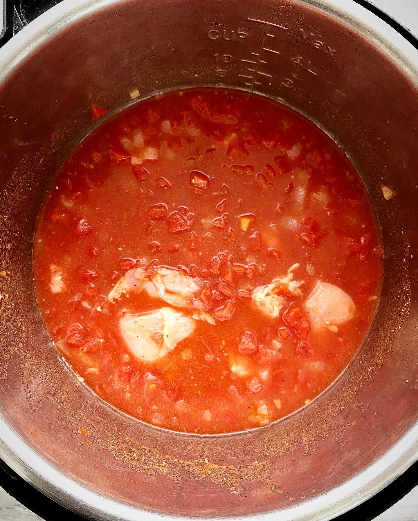 uncooked tomatoes with chicken in the instant pot