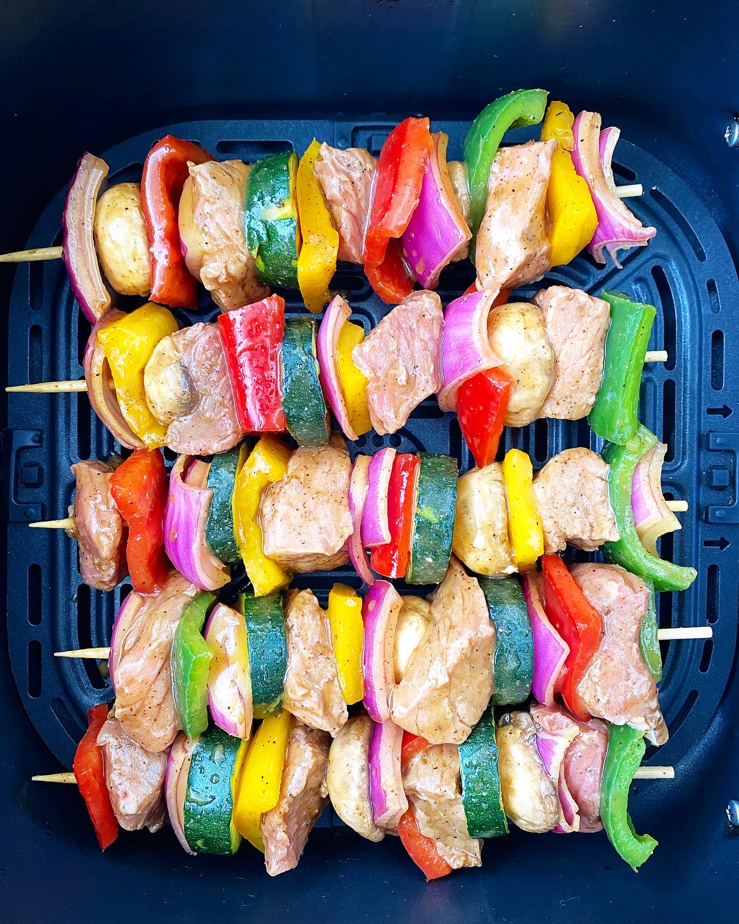 uncooked Creole beef kebabs in the air fryer