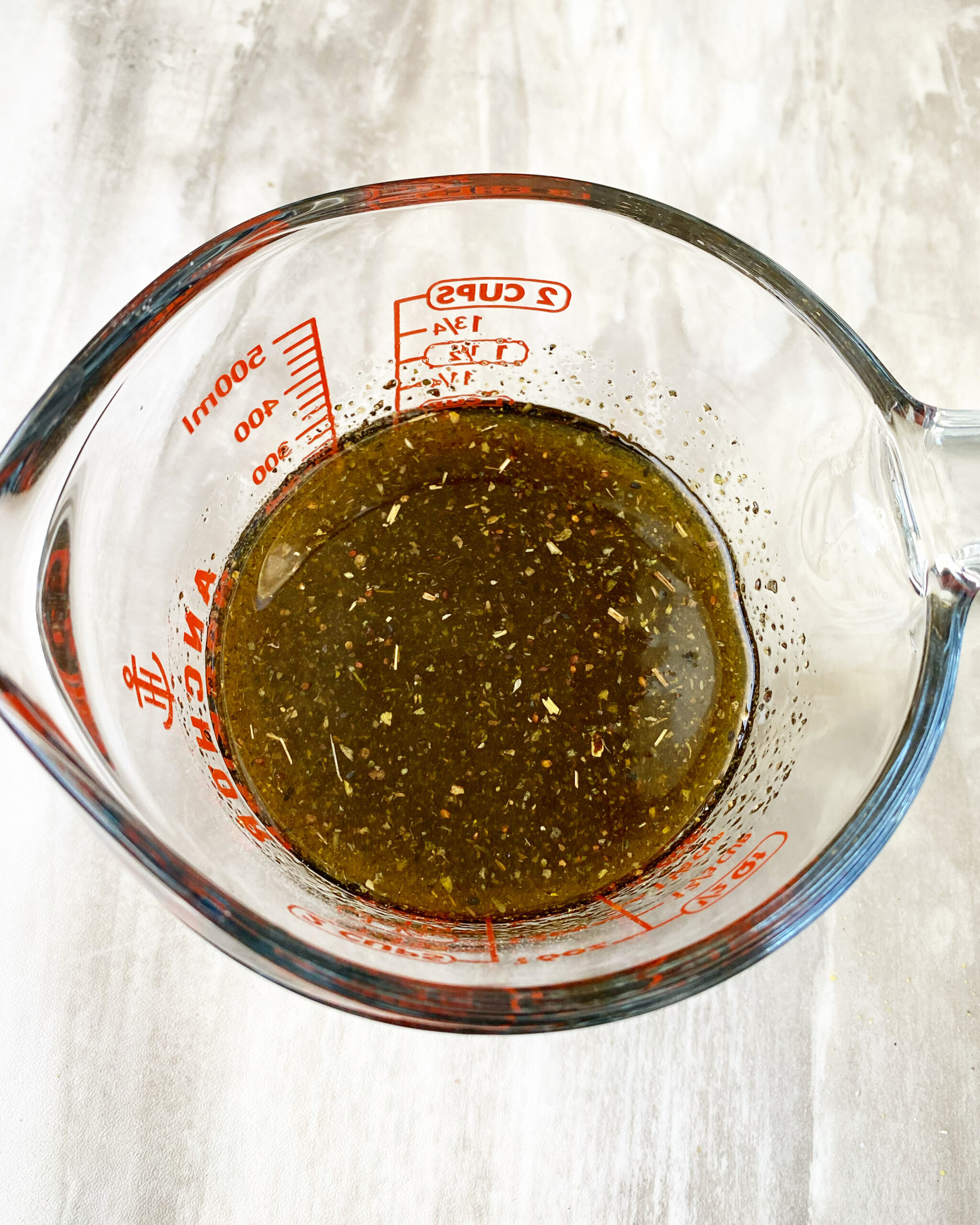 marinade in a glass measuring cup
