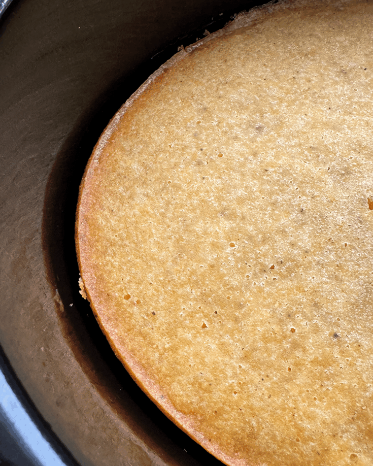 close up of Slow Cooker Cornbread in a black slow cooker