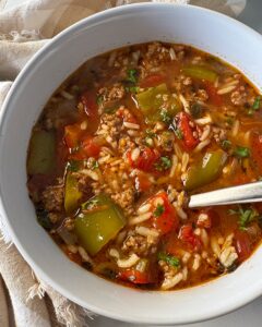 overhead shot of Stuffed Pepper Soup in a white bowl